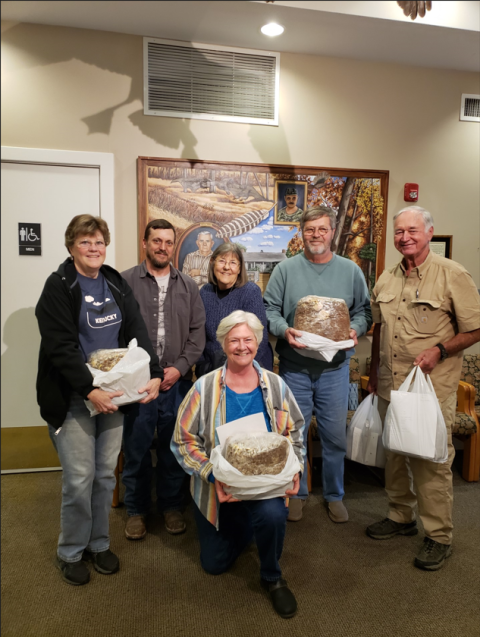 People posing with mushroom blocks