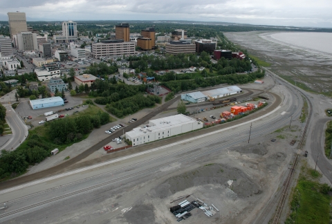 aerial view of a city hugging a coast