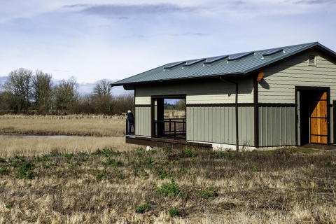 Outdoor classroom and observation blind over the marsh.