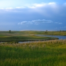 Thunderstorm over prairie wetlands in North Dakota