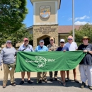 Group photo holding Kentucky Wild banner