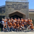 Group of people holding fish