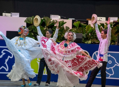 A group of four Panamanian dancers in traditional dress