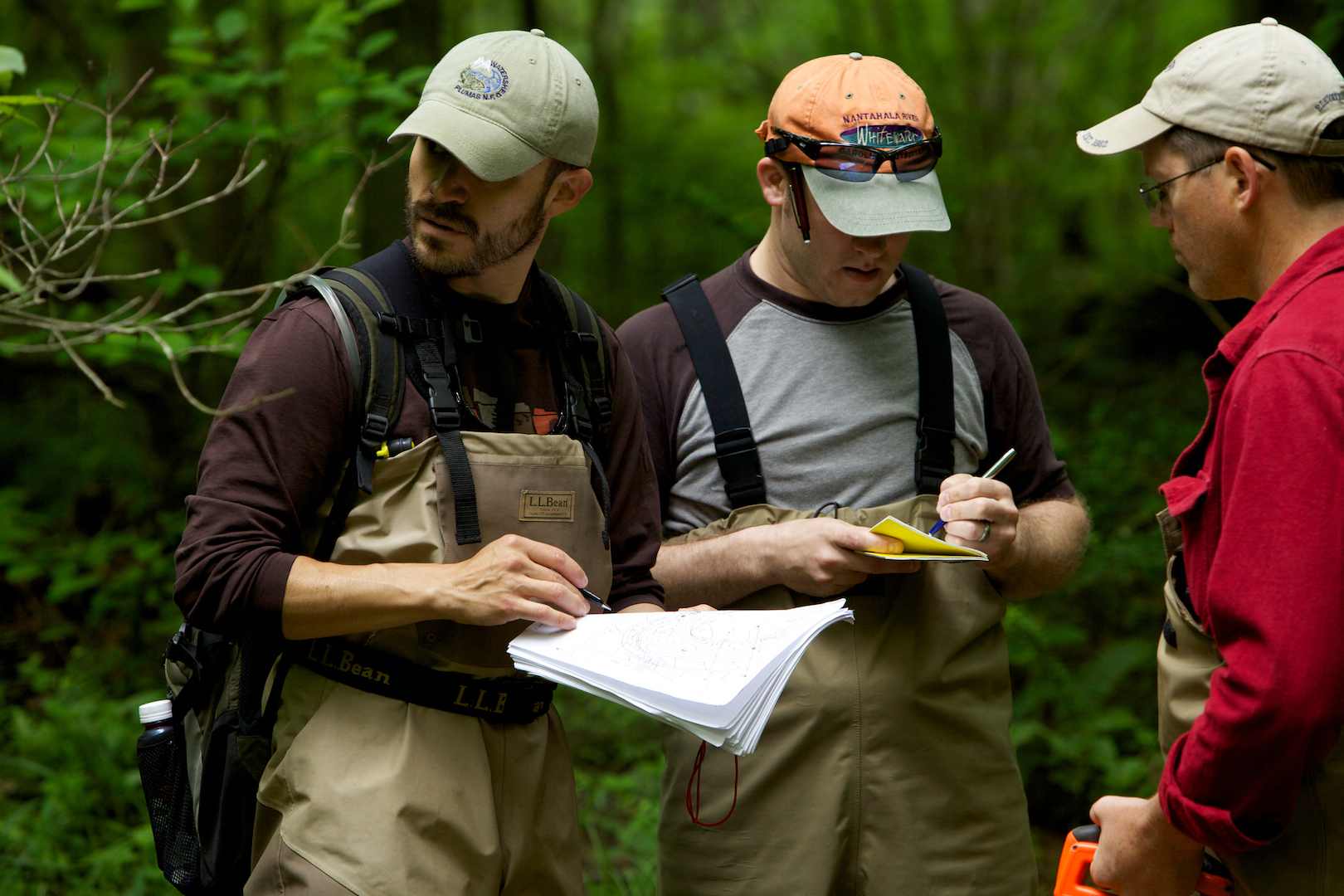 Fish and Wildlife Service employees surveying and assessing rivers and ...