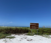 Beached Closed sign on Passage key NWR