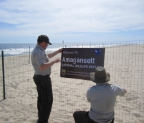 Refuge staff install fencing to protect beach nesting birds