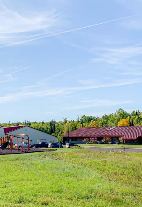 The Iron River National Fish Hatchery campus with picnic pavilion, playground, fish hatchery and visitor center