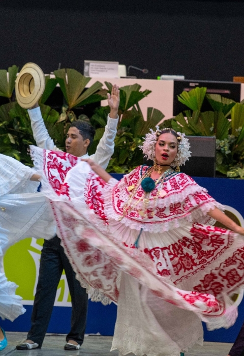 A group of four Panamanian dancers in traditional dress