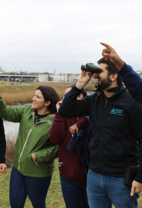 Participants in the annual Great Backyard Bird Count look for birds in Elizabeth, New Jersey, as part of the Elizabeth Urban Wildlife Refuge Partnership