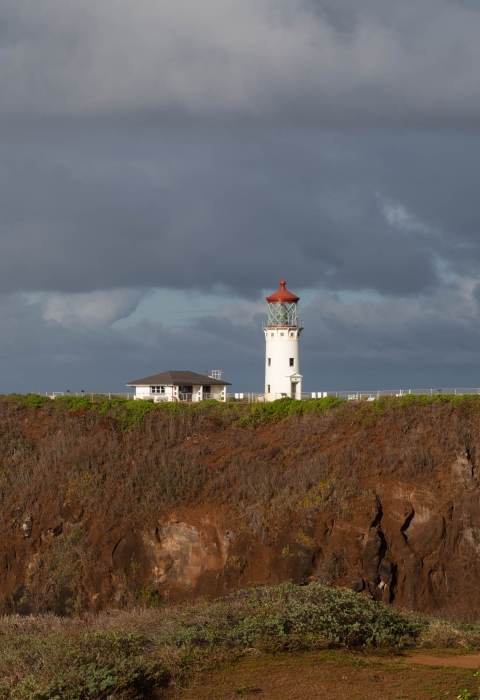 A rainbow is visible over Kīlauea Point Lighthouse, part of Kīlauea Point National Wildlife Refuge by Laurel Smith/USFWS