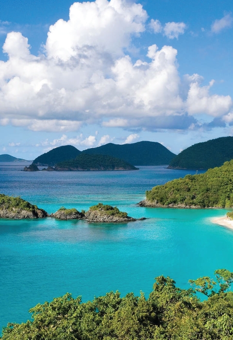 Shoreline of Virgin Island National Park with cays in the mid and background.