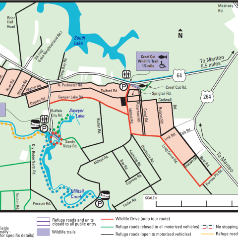 A complex map showing the refuge boundary, roads, and walking trails, colored in purple, green, and yellow to indicate access. For accessibility, please call 252-473-1131