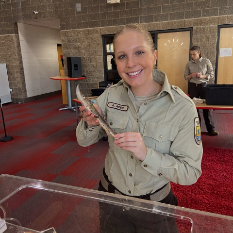 employee holding fish