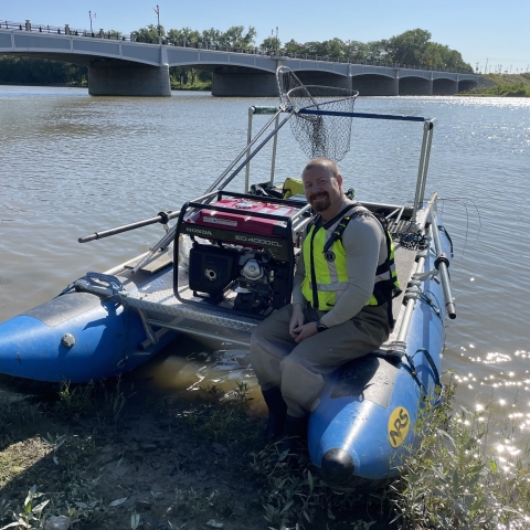 employee sitting on a boat