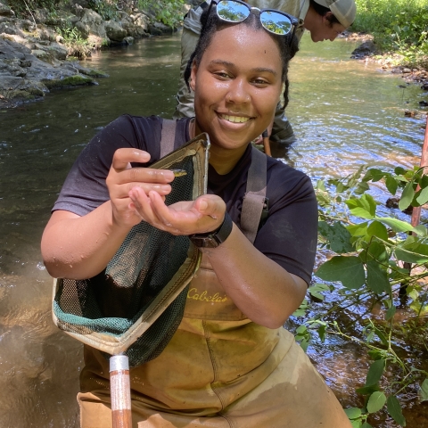 Kameryn holding a fish