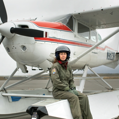 woman sitting on a float plane