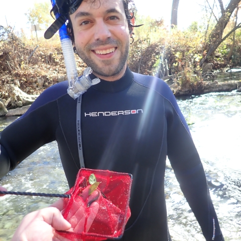 Tommy Funk with a wild salamander