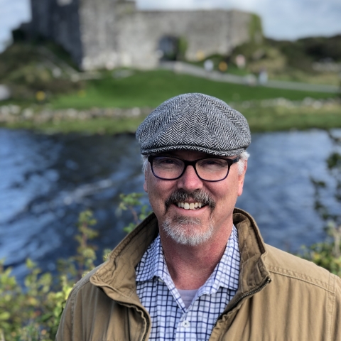 Bill Pearson in front of a castle in Ireland