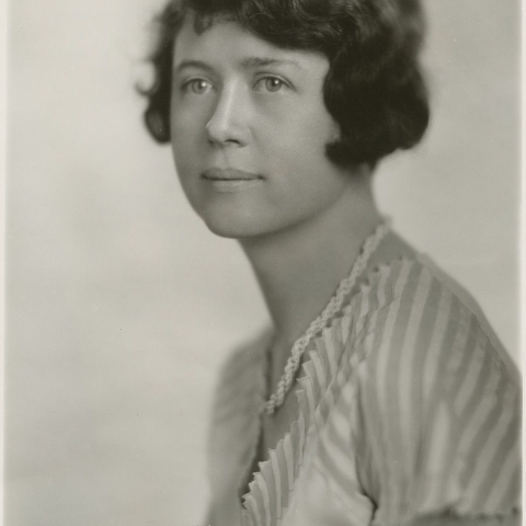 woman with short hair posing for photo