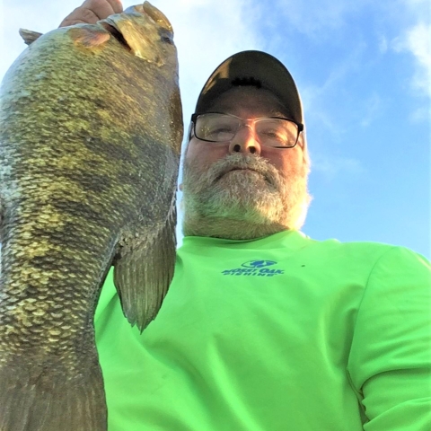 Tim Holding smallmouth bass