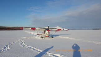 Plane landed on skis in snow 
