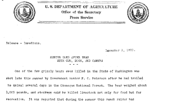 Hunter Goes After Bear With Gun, Dogs, and Camara December 3, 1923