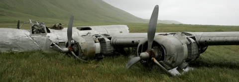 An airplane that crashed during WWII on Atka Island, a B-24D LIberator Bomber, rests on the tundra.