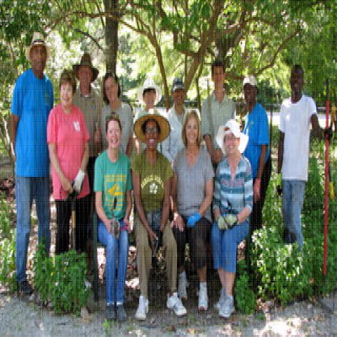 Volunteers posing for a picture after planting at the Yazoo NWR Butterfly Garden