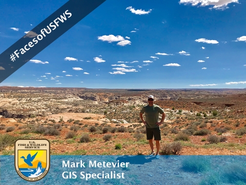 A man standing in the desert. A banner reads "#FacesofUSFWS". Another banner reads "Mark Metevier, GIS Specialist"