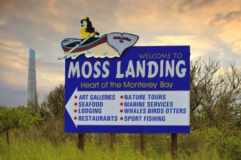 A large blue sign that says "Moss Landing"
