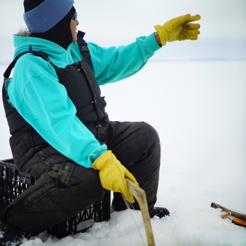 woman ice fishing