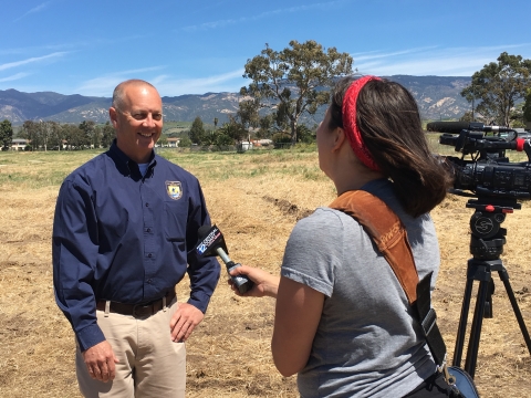 USFWS staff person being interviewed by reporter