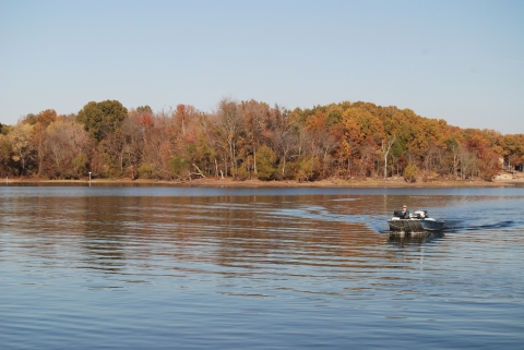 A motorized boat on a lake.