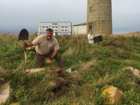 Refuge staff building Puffin burrows 