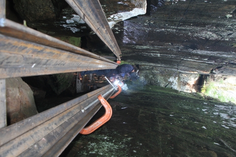 Welding a cave gate on an Ozark big-eared bat colony.