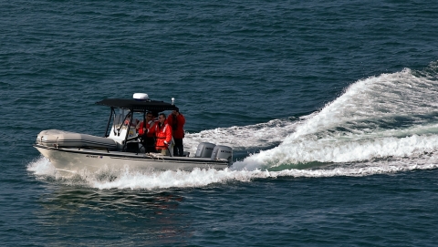 USFWS employees in a boat