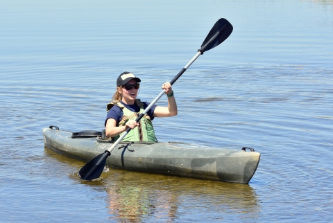 Young girl kayaking