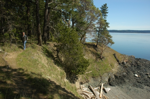 A Hiker Traverses the Rugged Turn Island Loop Trail