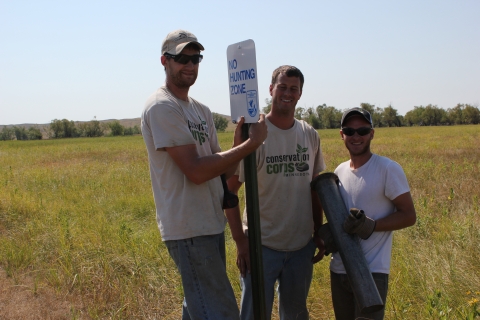 Conservation Corps members working at Lacreek NWR