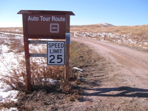 A brown sign along the auto tour route at Valentine Refuge