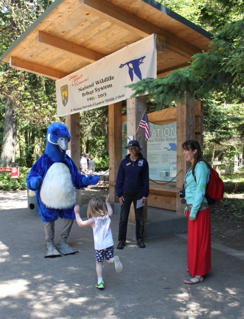 A Young Visitor Dances With The Blue Goose