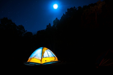 A Tent Glows in the Moonlight