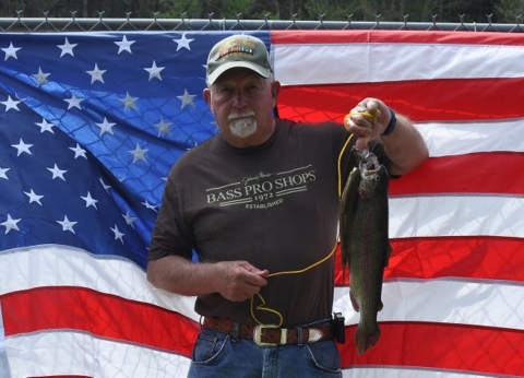 U.S. military veteran with his trout caught in Rock Creek at Chattahoochee Forest National Fish Hatchery