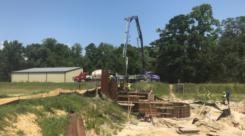 Cement is being pumped into forms to create a new kettle at Edenton NFH.