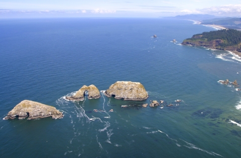 Aerial view of the 9 islands that make up Three Arch Rocks National Wildlife Refuge