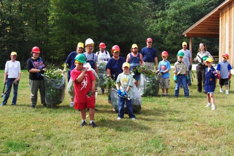 Group of National Public Lands Day Volunteers with Bags of Garlic Mustard
