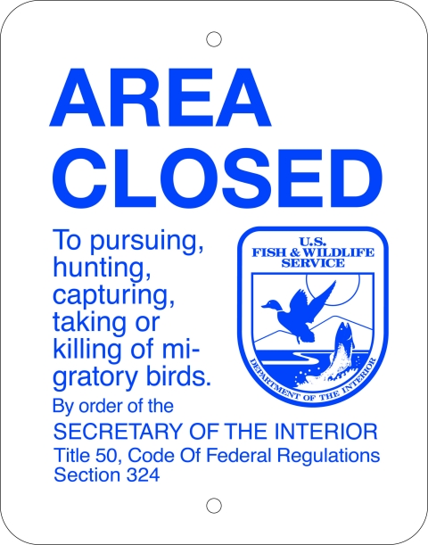 Area closed to hunting migratory birds sign.