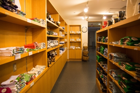 wooden shelves full of merchandise at a gift shop