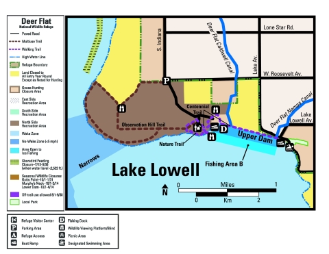Map showing hiking trails in the North Side Recreation Area, including the Observation Hill Trail, Nature Trail, and Centennial Trail. Also shows the locations of refuge visitor center, wildlife viewing platforms and blind, fishing dock, boat launches, and swimming beach.dhowing locations of 