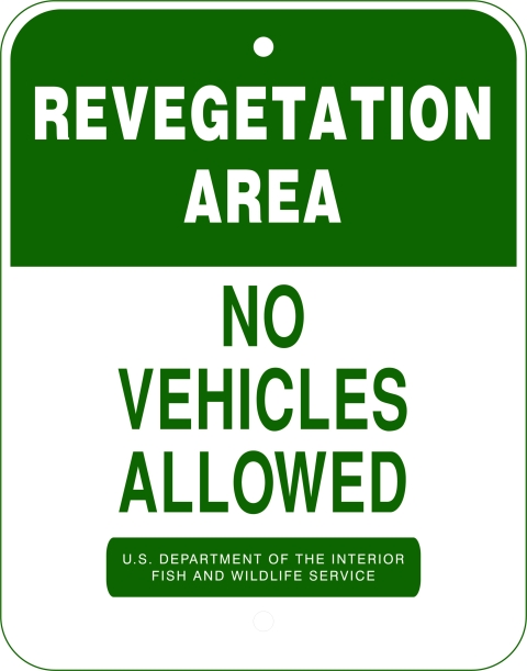 Sign for no vehicles allowed, revegetation area, USFWS.